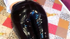 Squeezingmy ass in shiny vinyl pants