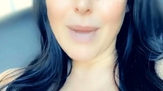 Busty curly brunette with big boobs fucks on couch