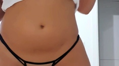 Big ass babe exposes her big boobs