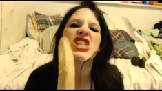 Cam girl dildo's her mouth so messy